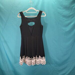 Black Sleeveless Dress With Lace Hem & Bow Back Design By Pink Owl Size S